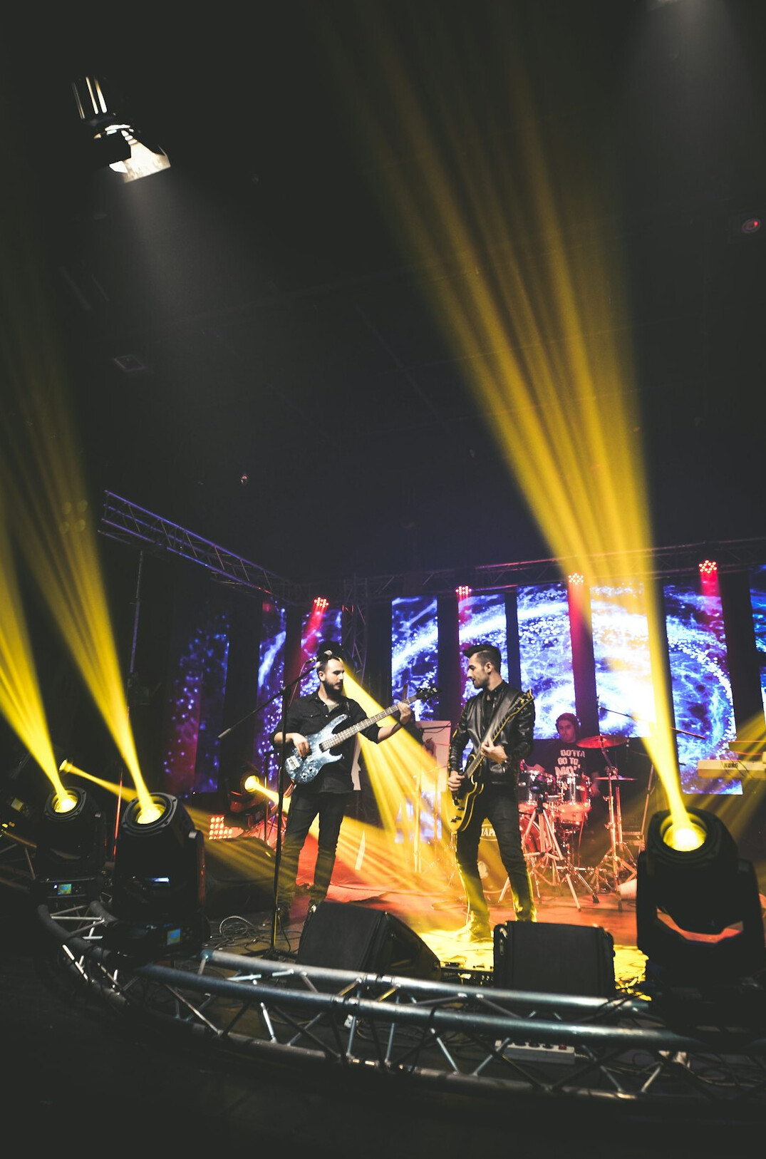 Stage with professional lighting rig and beams of light