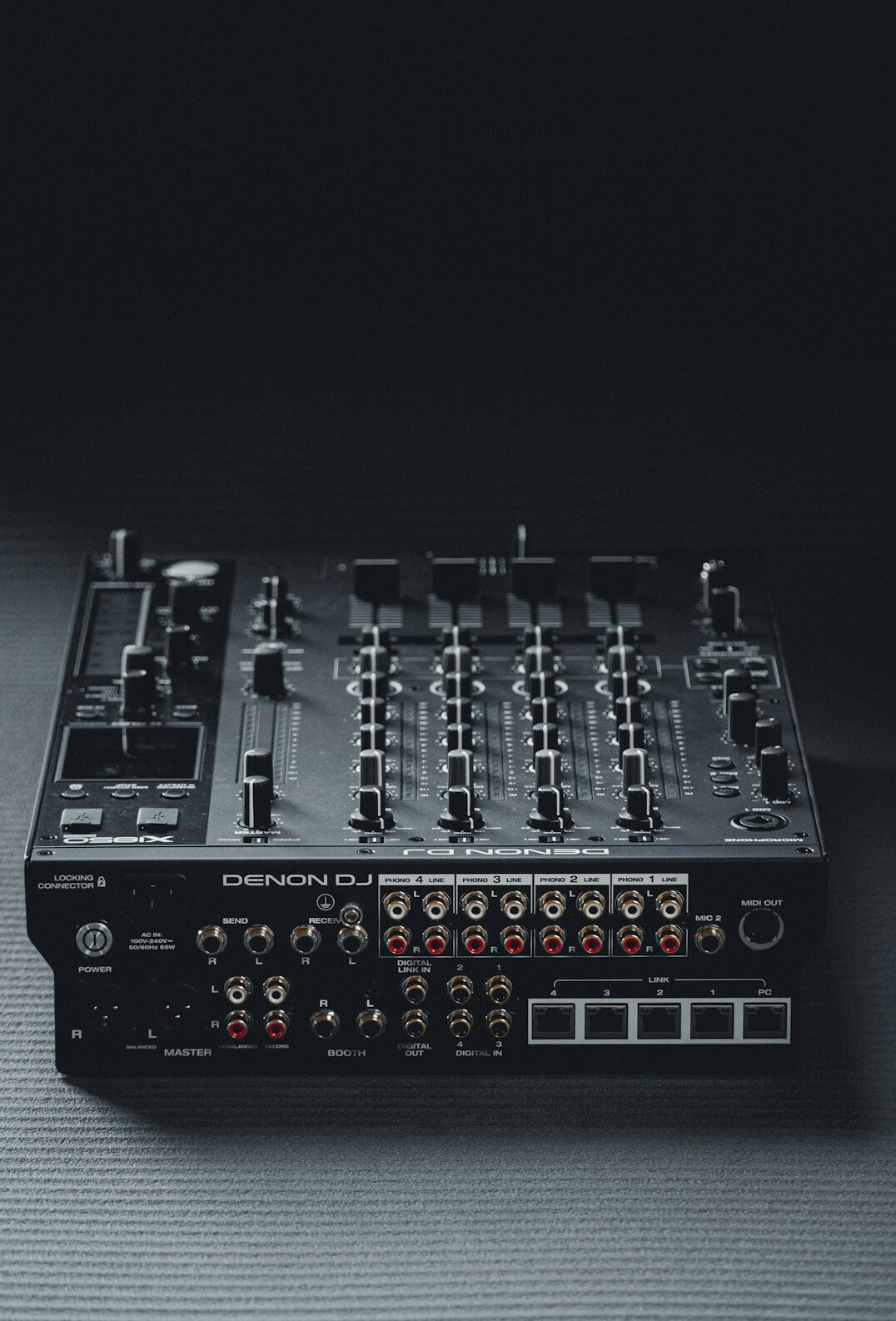 Professional audio mixing console with faders